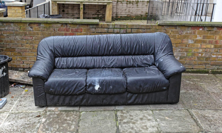 Old Sofa Waiting For Rejected Furniture Collection